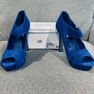 Steve Madden "Lorane" peep-toe platform heels in blue suede. Size 9